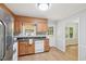 Functional kitchen featuring plenty of cabinet space, granite countertop and stainless steel appliances at 1308 Swallow Dr, Raleigh, NC 27606