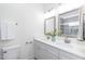 Chic bathroom featuring dual sinks, quartz countertops, and modern fixtures, offering luxury and convenience at 1318 N Alston Ave, Durham, NC 27701