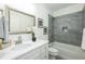 Contemporary bathroom with quartz countertops, a soaking tub, and modern fixtures, offering comfort and style at 1318 N Alston Ave, Durham, NC 27701