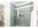 Beautifully tiled glass shower with built-in niches for bath products in this modern bathroom at 1318 N Alston Ave, Durham, NC 27701