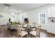 Bright and airy dining area open to the living room with hardwood floors and modern decor at 1318 N Alston Ave, Durham, NC 27701