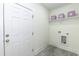 A simple mud room provides a space to drop coats and shoes, right inside of the home's exterior door at 1318 N Alston Ave, Durham, NC 27701