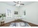 Bright office space features a stylish desk, a modern rug, and plenty of natural light, ideal for productivity at 1318 N Alston Ave, Durham, NC 27701