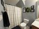 Bathroom showcasing a shower, toilet, and modern decor at 148 Langston Ridge Dr Dr, Angier, NC 27501