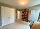 Bedroom showcasing a large closet, bookshelf, and neutral carpeting at 148 Langston Ridge Dr Dr, Angier, NC 27501