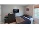 Bedroom showcasing a TV, dresser, and neutral carpet at 148 Langston Ridge Dr Dr, Angier, NC 27501
