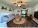 Bright living room features an open layout with hardwood floors and comfortable couches at 148 Langston Ridge Dr Dr, Angier, NC 27501