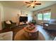Cozy living room showcasing natural light and hardwood floors and comfortable chair seating at 148 Langston Ridge Dr Dr, Angier, NC 27501