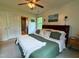 Comfortable bedroom featuring natural light, ceiling fan, and carpet floors at 148 Langston Ridge Dr Dr, Angier, NC 27501