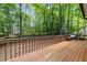 Expansive back deck perfect for entertaining, with built-in seating and views of the serene backyard at 15 Gray Fox Ct, Durham, NC 27713