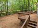 Multi-level back deck overlooking a picturesque, tree-filled backyard at 15 Gray Fox Ct, Durham, NC 27713