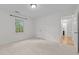 Bedroom with neutral carpeting, a double closet, and a window at 15 Gray Fox Ct, Durham, NC 27713