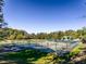 Well-maintained community tennis courts surrounded by lush greenery at 15 Gray Fox Ct, Durham, NC 27713