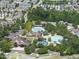 Overhead shot featuring the community pool with umbrellas and nearby homes at 167 Monteith Dr, Chapel Hill, NC 27516