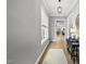 Entryway features hardwood floors, neutral walls, and access to living spaces at 167 Monteith Dr, Chapel Hill, NC 27516