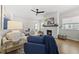 Comfortable living room offers a brick fireplace, hardwood floors, and open concept layout at 167 Monteith Dr, Chapel Hill, NC 27516