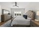 Inviting main bedroom suite features a ceiling fan, large window, and a luxurious rug at 167 Monteith Dr, Chapel Hill, NC 27516