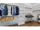 Spacious walk-in closet with custom shelving, hanging rods, and ample storage solutions at 167 Monteith Dr, Chapel Hill, NC 27516