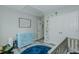 bedroom featuring a blue dresser, closet and modern wood laminate flooring at 169 Forest Dr, Graham, NC 27253