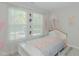 Bedroom with light hard surface floors and a canopy over the bed at 169 Forest Dr, Graham, NC 27253