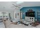 Open-concept dining area adjacent to the living room and kitchen, featuring a large table and ample seating at 169 Forest Dr, Graham, NC 27253