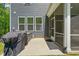 View of back patio and grill area with access to screened in porch at 187 Harpers Landing Rd, Garner, NC 27529