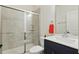 Modern bathroom with a glass shower, contemporary vanity, and neutral finishes at 187 Harpers Landing Rd, Garner, NC 27529