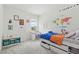 Bright bedroom with colorful decorations, a built-in bed, and plenty of natural light at 187 Harpers Landing Rd, Garner, NC 27529