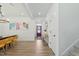 Inviting foyer showcases modern decor, stylish lighting, and a welcoming red front door at 187 Harpers Landing Rd, Garner, NC 27529