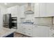 Close up of a gourmet kitchen featuring stainless steel appliances and granite countertops at 187 Harpers Landing Rd, Garner, NC 27529