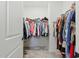 Walk-in closet with an ample amount of hanging space for clothing and shelves for storage at 187 Harpers Landing Rd, Garner, NC 27529