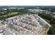 Aerial view showcasing the neighborhood's layout, featuring well-maintained landscaping and consistent architectural design at 209 Timber Forest Ln, Cary, NC 27519