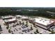 Aerial view of a shopping center with various stores and parking at 209 Timber Forest Ln, Cary, NC 27519
