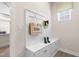 This mudroom has a built-in bench, storage, and hooks for organization at 210 Bluebell St, Sanford, NC 27330