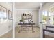 Bright home office with neutral decor and large windows for natural light at 210 Bluebell St, Sanford, NC 27330