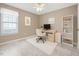 Office or bedroom with natural light, neutral walls, area rug and ceiling fan at 212 Southerby Dr, Garner, NC 27529