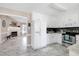 Spacious kitchen with white cabinets, modern appliances, and an open view to the living room at 212 Southerby Dr, Garner, NC 27529