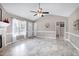 Spacious living room with tile floors and a view of the entry and bathroom at 212 Southerby Dr, Garner, NC 27529