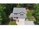 Aerial view of the home showcasing its location, roof, and well-maintained yard at 2310 Turning Pointe Way, Hillsborough, NC 27278