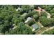 Wide aerial shot displaying the home's neighborhood and surrounding lush greenery at 2310 Turning Pointe Way, Hillsborough, NC 27278