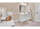 Bathroom featuring white vanity, excellent lighting and ample counter space at 2310 Turning Pointe Way, Hillsborough, NC 27278