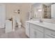 Bright bathroom featuring a single sink vanity and tiled flooring at 2310 Turning Pointe Way, Hillsborough, NC 27278