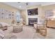 Bright living room featuring fireplace, neutral colors, and cozy seating at 2310 Turning Pointe Way, Hillsborough, NC 27278