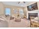Comfortable living room featuring a fireplace, neutral tones, and a relaxing atmosphere at 2310 Turning Pointe Way, Hillsborough, NC 27278