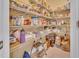 Organized pantry with wire shelving stocked with food and household essentials at 2310 Turning Pointe Way, Hillsborough, NC 27278