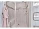 Modern shower featuring tile surround, built-in bench and rainfall shower head at 2310 Turning Pointe Way, Hillsborough, NC 27278