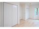 Bedroom featuring hardwood floors and large closets at 26 Mt. Bolus Rd, Chapel Hill, NC 27514