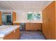 Bright kitchen featuring wood cabinets, stainless steel appliances and light countertops at 26 Mt. Bolus Rd, Chapel Hill, NC 27514