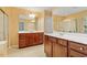 Bathroom with a double vanity, tile floors, and natural light at 2614 Laurelcherry St, Raleigh, NC 27612