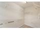 Walk-in closet with built-in white wire shelving for ample storage at 2614 Laurelcherry St, Raleigh, NC 27612